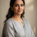 Maneka J.